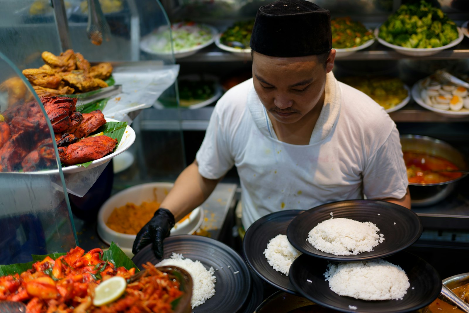 Thai food vendor serving rice