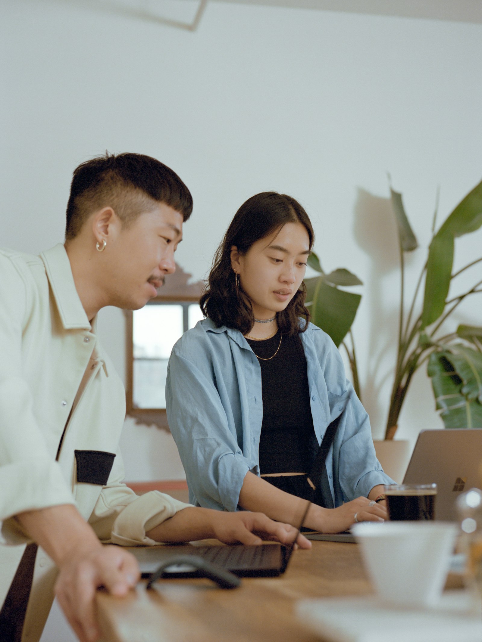 An Asian sales team in discussion